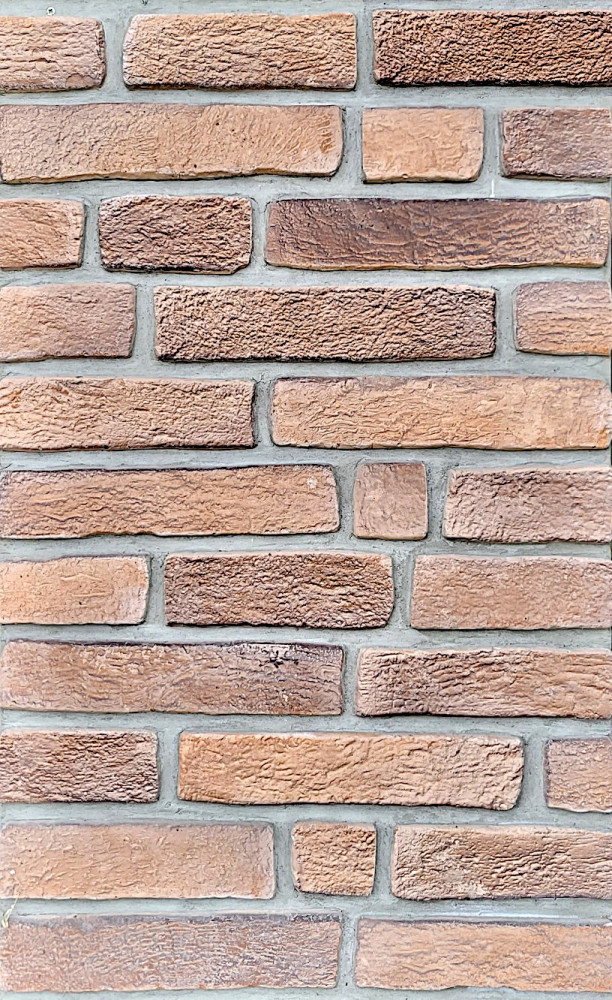 Kültéri tégla falburkolat